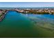 Aerial view of waterfront neighborhood with boating access to the ocean, coastal living at its finest at 366 La Hacienda Dr, Indian Rocks Beach, FL 33785