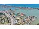 Aerial view of waterfront community with stunning coastal and water views, with easy access to nearby conveniences and amenities at 4725 Cove Cir # 302, St Petersburg, FL 33708