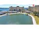 Waterfront community offering tranquil views of a canal, with convenient parking and easy access to nearby amenities at 4725 Cove Cir # 302, St Petersburg, FL 33708