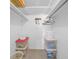 Walk-in closet with ample shelving and storage space at 4725 Cove Cir # 302, St Petersburg, FL 33708