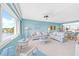 Bright living room with a water view and comfortable seating at 4725 Cove Cir # 302, St Petersburg, FL 33708