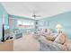 Bright living room filled with comfortable seating and amazing views at 4725 Cove Cir # 302, St Petersburg, FL 33708