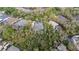 Aerial view of a serene neighborhood surrounded by lush greenery and mature trees providing privacy at 5806 Terncrest Dr, Lithia, FL 33547