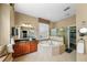 Bright bathroom features a soaking tub, a separate glass shower, and dual sink vanities at 5806 Terncrest Dr, Lithia, FL 33547