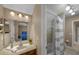 Bathroom featuring single vanity, commode, and combination shower and bathtub at 5806 Terncrest Dr, Lithia, FL 33547