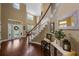 Grand foyer with high ceilings, hardwood floors, and a beautiful staircase at 5806 Terncrest Dr, Lithia, FL 33547