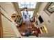 Open Living Room with a fireplace, high ceilings, fan and natural light at 5806 Terncrest Dr, Lithia, FL 33547