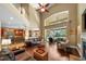 Open concept living room boasts high ceilings and seamless access to kitchen and outdoor spaces at 5806 Terncrest Dr, Lithia, FL 33547