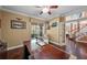 Bright office space with a ceiling fan, hardwood floors, and french doors at 5806 Terncrest Dr, Lithia, FL 33547