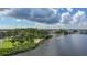Beautiful waterfront views with lush greenery and boats visible from this waterfront property at 600 Reserve Ln, Dunedin, FL 34698