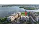 Overhead view of condos with lush landscaping in a beautiful neighborhood near the water at 600 Reserve Ln, Dunedin, FL 34698