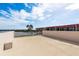 Large rooftop terrace offering expansive views of the water and nearby buildings at 600 Reserve Ln, Dunedin, FL 34698