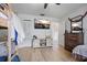 Bedroom features a bunk bed with a twin bed, a dresser, and a mounted TV at 6262 142Nd N Ave # 1106, Clearwater, FL 33760