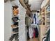 Walk-in closet offering plentiful storage solutions for clothing, shoes, and accessories at 6262 142Nd N Ave # 1106, Clearwater, FL 33760