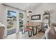 Bright dining area with a modern table and bench seating at 6262 142Nd N Ave # 1106, Clearwater, FL 33760