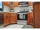 Close-up of the kitchen, showcasing the oven and backsplash at 6262 142Nd N Ave # 1106, Clearwater, FL 33760