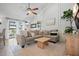 Spacious living area with a large sectional sofa and natural light at 6262 142Nd N Ave # 1106, Clearwater, FL 33760