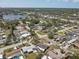 A neighborhood featuring a pond, single-Gathering homes, and tree-lined streets at 9100 2Nd N St, St Petersburg, FL 33702