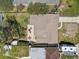 An aerial view of the home with a patio, outdoor kitchen, and large backyard at 9100 2Nd N St, St Petersburg, FL 33702
