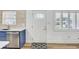A nice kitchen with stainless appliances, white countertops, and blue cabinets at 9100 2Nd N St, St Petersburg, FL 33702
