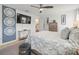 Spacious bedroom featuring a modern ceiling fan, and stylish decor for a comfortable retreat at 9617 Branching Ship Trce, Wesley Chapel, FL 33545