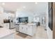 Open kitchen view showcasing stainless steel appliances and a seamless transition into the dining area at 9617 Branching Ship Trce, Wesley Chapel, FL 33545