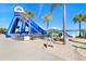 A large water slide is featured in the community's water park at 9617 Branching Ship Trce, Wesley Chapel, FL 33545
