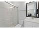 Modern bathroom featuring a glass-enclosed shower and contemporary vanity at 98 29Th S St, St Petersburg, FL 33712