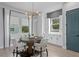 Bright dining room with decorative lighting, lots of storage and windows for natural light at 98 29Th S St, St Petersburg, FL 33712