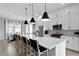 Spacious kitchen with white cabinets, a large island, and modern appliances at 98 29Th S St, St Petersburg, FL 33712
