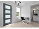 Modern office space featuring a window, decorative lighting and an adjacent bathroom at 98 29Th S St, St Petersburg, FL 33712