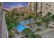 Aerial view of the pool and lounge areas amid lush tropical greenery at 100 1St N Ave # 1005, St Petersburg, FL 33701