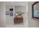 Inviting hallway with tiled floors, decorative art, and accent furniture pieces at 100 1St N Ave # 1005, St Petersburg, FL 33701