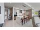 Open-concept kitchen with island seating, stainless steel appliances, and custom cabinetry offers a modern feel at 100 1St N Ave # 1005, St Petersburg, FL 33701