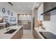 Well-appointed kitchen with a sleek cooktop, oven, wine cooler, and breakfast bar, ideal for entertaining at 100 1St N Ave # 1005, St Petersburg, FL 33701