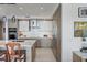 Bright and modern kitchen equipped with stainless appliances, stylish cabinetry, and a spacious center island at 100 1St N Ave # 1005, St Petersburg, FL 33701