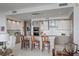 Spacious kitchen with sleek island, pendant lighting, and modern appliances, perfect for culinary enthusiasts at 100 1St N Ave # 1005, St Petersburg, FL 33701