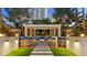 Comfortable outdoor seating area with lush landscaping and walkway at 100 1St N Ave # 1005, St Petersburg, FL 33701