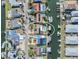 Waterfront property featuring a private pool and dock with direct access to the canal at 1012 Spindle Palm Way, Apollo Beach, FL 33572