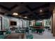 The game room is decorated with a tropical theme and has a pool table at 11290 Boundless Ter, Venice, FL 34293