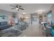 Bright, open living space seamlessly connects the living room, dining area, and kitchen at 11728 Carissa Ln # 0, New Port Richey, FL 34654
