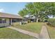 A large shady tree highlights the backyard of this well-maintained property at 1203 16Th Se Cir, Largo, FL 33771