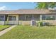 Beautiful backyard with lush green grass, screened lanai, and outdoor space for entertaining at 1203 16Th Se Cir, Largo, FL 33771