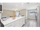Updated kitchen with breakfast bar seating and stainless steel appliances at 1203 16Th Se Cir, Largo, FL 33771