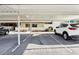 Designated parking space at this well-maintained property with tropical landscaping at 1203 16Th Se Cir, Largo, FL 33771