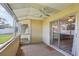 Relaxing screened patio with a view of the backyard and access to the interior at 1203 16Th Se Cir, Largo, FL 33771