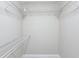 Spacious walk-in closet featuring multiple levels of white wire shelving for organization at 1203 16Th Se Cir, Largo, FL 33771