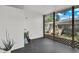 Relaxing enclosed porch overlooking a private backyard at 129 Nw Lincoln N Cir, St Petersburg, FL 33702