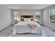 Comfortable bedroom with large windows and natural light creates a relaxing atmosphere at 13042 Pennybrook Dr, Riverview, FL 33579