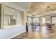 Open-concept clubhouse with a serving area, tables, and a stylish design at 13042 Pennybrook Dr, Riverview, FL 33579